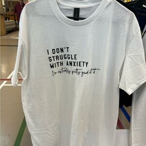 White Graphic T-Shirt with Anxiety Quote.